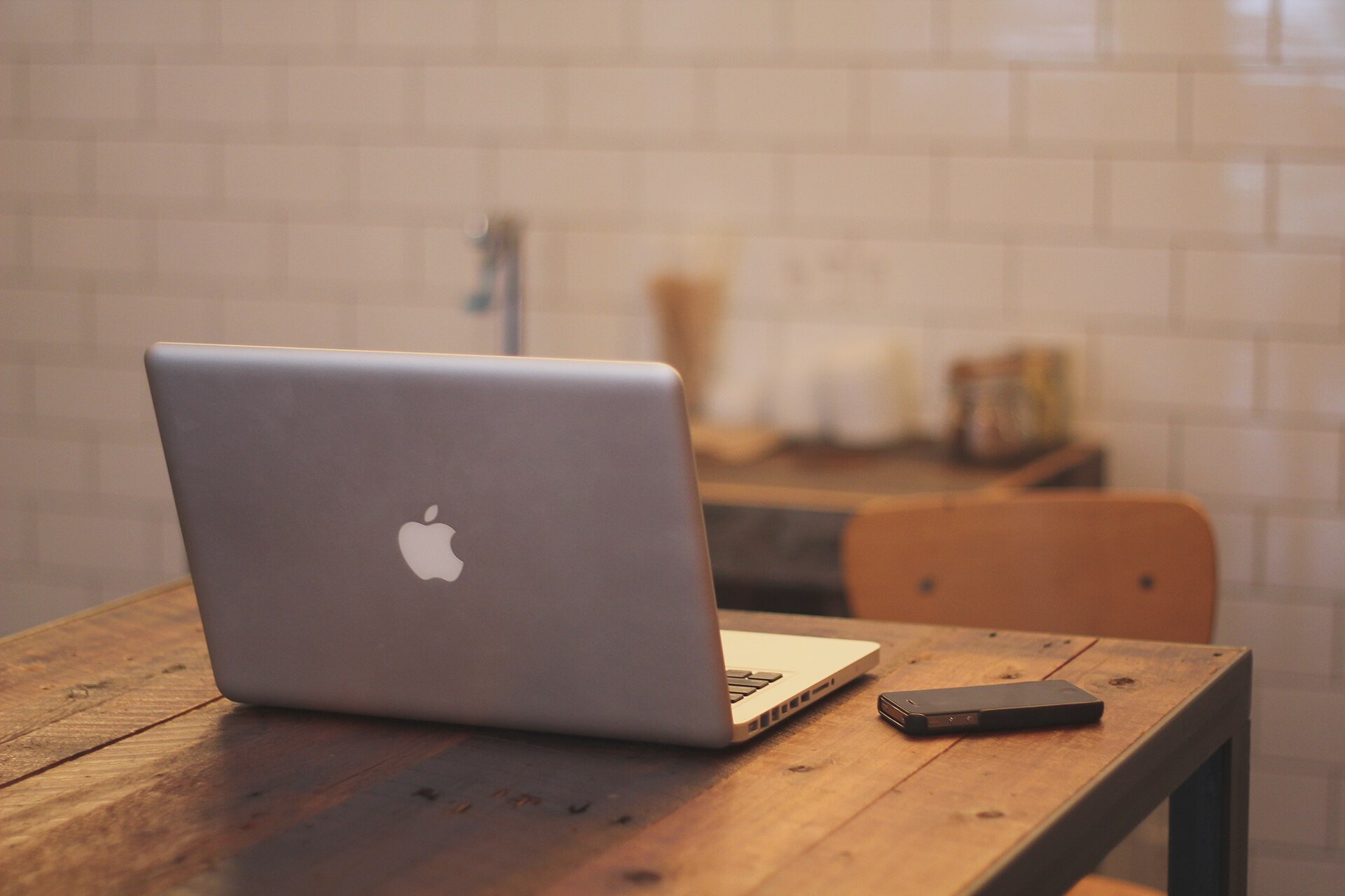 Developer workspace with laptop and monitors for release work